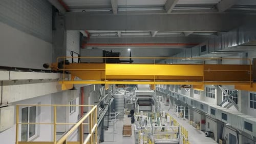 Industrial Lifting Crane at the Enterprise That Travels on Rails