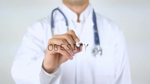 Obesity Doctor Writing on Glass