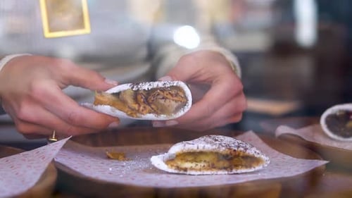 Woman Holds Tasty Tapioca with Caramelized Banana Filling