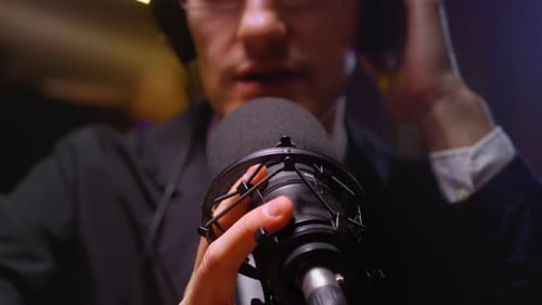 A Man a Journalist or Blogger Speaks Into the Microphone Starts a Podcast Creating an Audio Stream