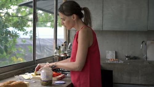Couple Cooking Together in Kitchen at Home