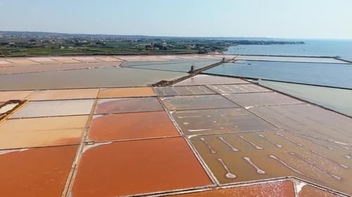 Aerial drone view of colorful salt pans in Sicily Italy landscape