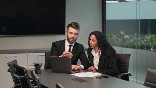 Collaboration Between Professionals in a Modern Office Setting