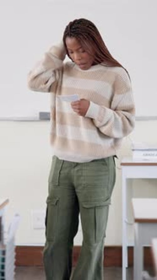 Assignment, education and presentation with student black woman in classroom of college for speech