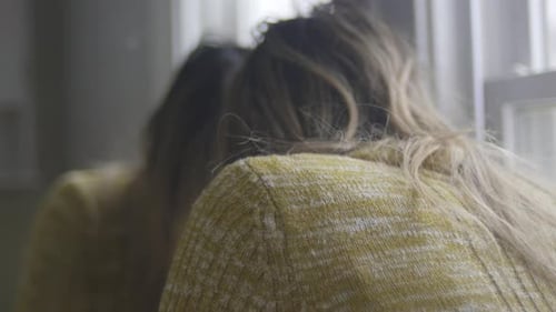 Woman Reflecting in Mirror, Close Up