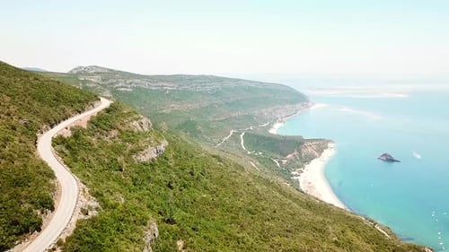 Winding road along the coast in Parque Natural da Arrábida, Portugal