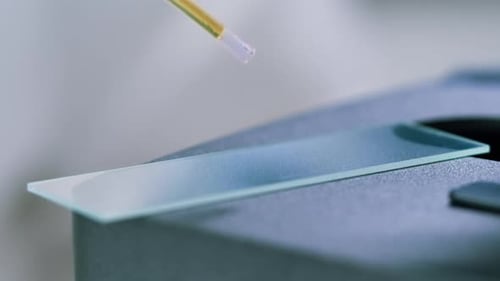 Engineer Doctor Working with Microscope in Laboratory Scientific Laboratory with Various Research