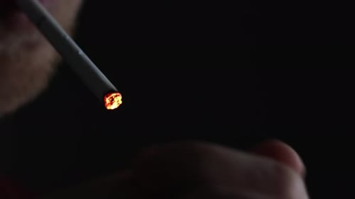 Man Lights a Cigarette Bad Habit Nicotine Addiction Harm to Health