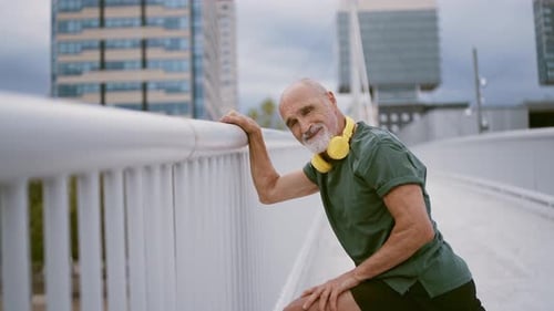 Senior Man Stretching Outdoors in Urban Setting