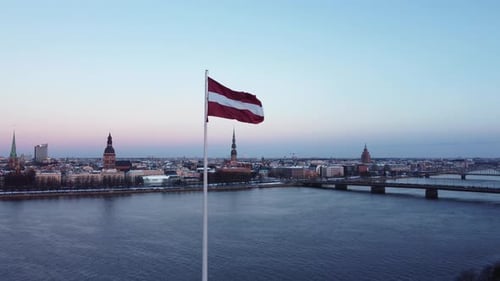 Flag Waving in Front of European City