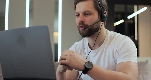 Bearded Man Talking On Video Call At Home