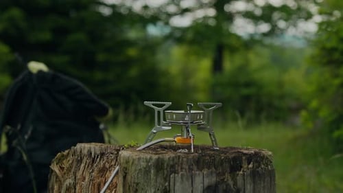 Portable Gas Stove Cooking in Forest