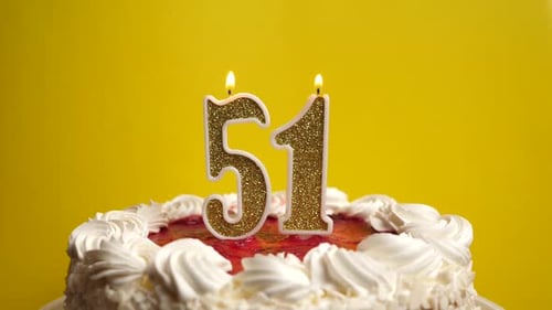 51ю They blow out a candle in the form of the number 51, which is stuck into the holiday cake. Celeb