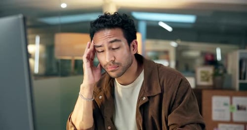 Stress, headache and businessman in office with burnout, fatigue or exhaustion with creative