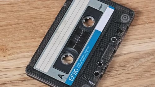 Audio Cassette Tape on Wooden Surface