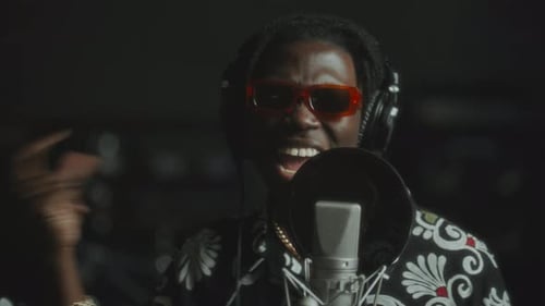 Expressive African American Singer Recording New Track in Music Studio