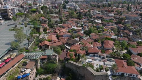 Aerial View of Houses with Tiled Roofs in Old Town Square Ancient Monuments and Mosque with Minaret