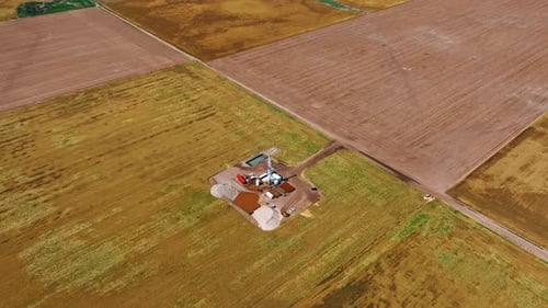Distancing form the gas drilling site located in the vast field.