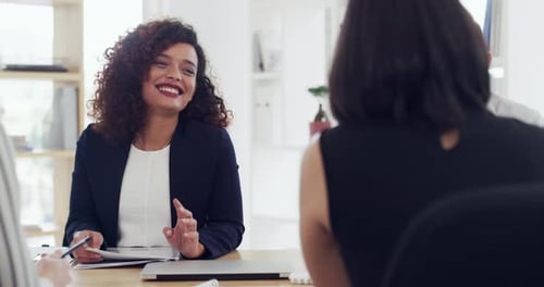 4k video footage of a diverse group of businesspeople sitting and having a meeting in the office