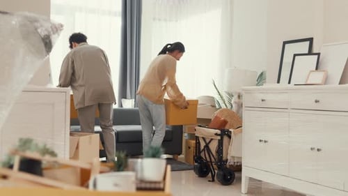 Young Couple Moving Into New Home Together
