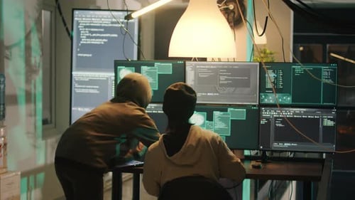 Coders Working Together in Modern Office Environment