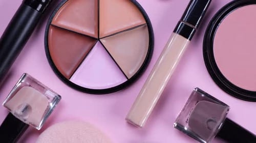 Rotating Background with Decorative Cosmetics Blush Concealer Powder Shadows Nail Polish Makeup