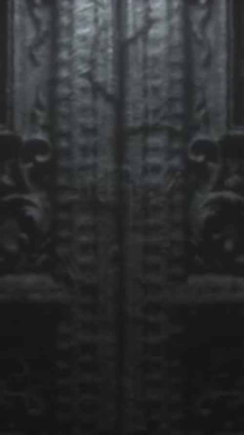 Old gothic stone door to hell with patterns. The doors open. Moving the camera forward. 3d animation