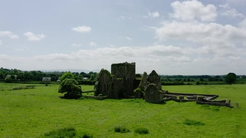 Orbiting drone shot of an abandoned castle in Europe.