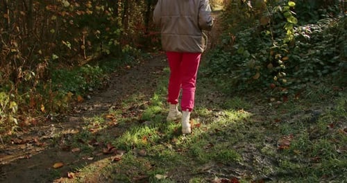 The Camera Follows a Woman on a Trip or Adventure