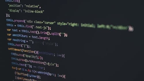 Programmer Coding on Computer