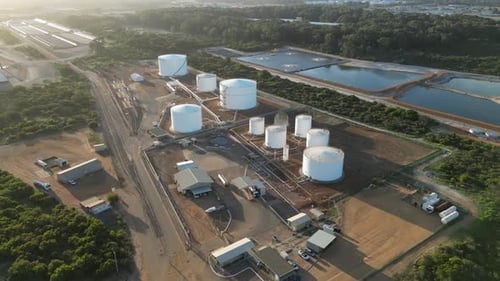 Big silos for grain storage, Esperance city in Western Australia. Aerial drone view at sunset