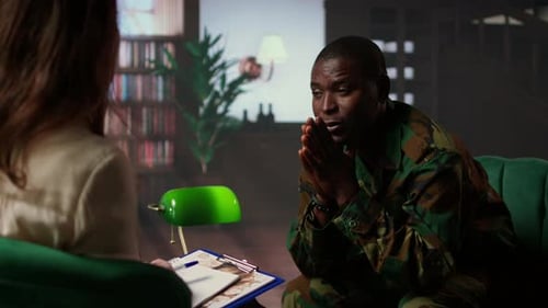 Man in Uniform Attends Therapy Session