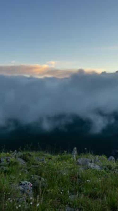 Fast moving dramatic clouds in mountains