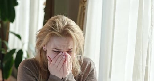 Distraught Woman Experiencing Strong Mixed Emotions