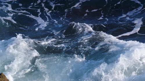 Sea Waves Crashing On Rocks