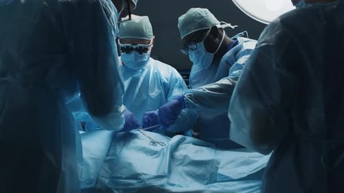 Surgical Team Performing Operation in Hospital Operating Room