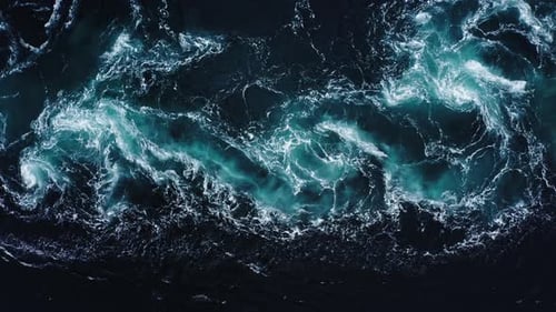 Waves of Water of the River and the Sea Meet Each Other During High Tide and Low Tide