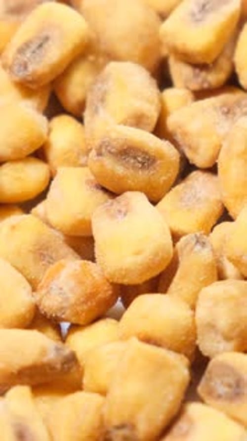 Dried Corn Rotates in a Circle Corn Background Vertical Video