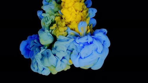 Yellow Blue Cloud Ink Spreading in Water Abstract Colorful Background with Black Color