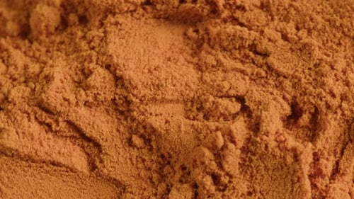 Macro Shot of Golden Brown Powder