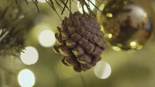 Festive Christmas Pinecone Decoration Hanging on Tree