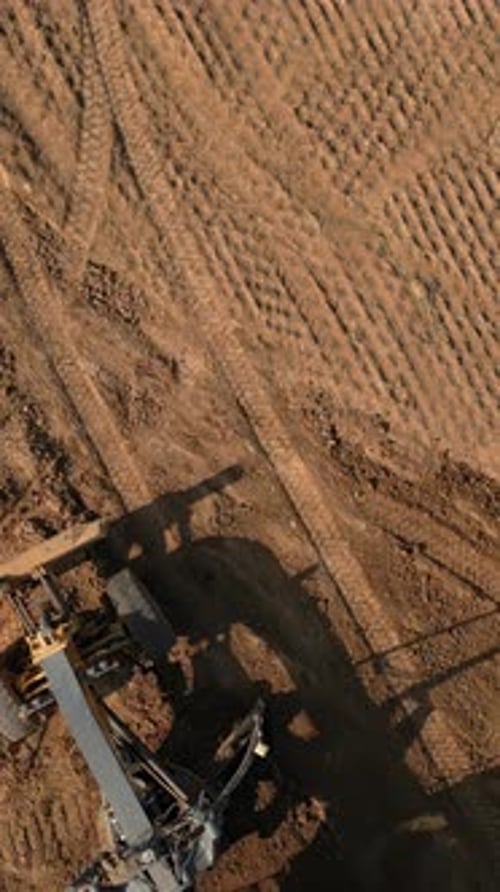 Grader Leveling Ground on Construction Site Clip