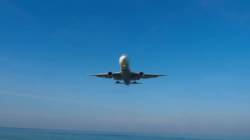 Airplane in the Blue Sky