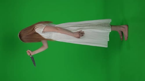 Fullsize Side View Vertical Green Screen Chroma Key Video of a Posessed Female Woman Figure Ghost