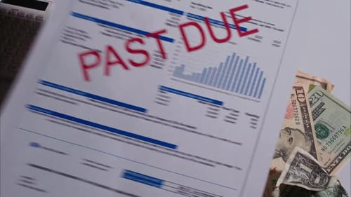 Past Due Natural Gas Bill Drops Down into Shot. Shot with ARRI Alexa in ARRIRAW at 23.98 fps and exp