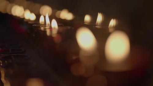 Candles Flicker Softly in the Dark Interior