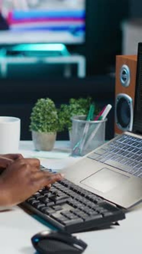 Vertical Video Data Scientist Using Laptop Updating Artificial Intelligence Machine Learning