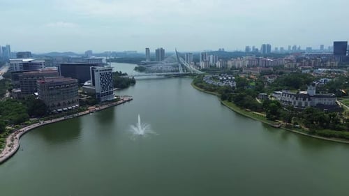 Cityscape of Putrajaya Malaysia Seri Wawasan Bridge over the Putrajaya Lake, aerial drone