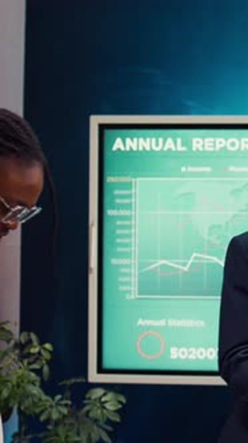 Startup Colleagues Reviewing Data to Improve Customer Satisfaction and Retention