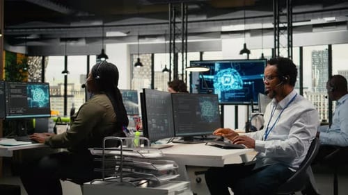 Colleagues Working at Computers in Modern Office